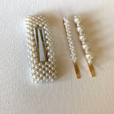 Style your hair with these beautiful trio of pearl clips. It is the perfect accessory to any outfit! Large pearl clip in silver and two pearl pins in gold. Can be worn each as a single clip or pin or stacked together. You can also mix and match with another favourite clip of yours!  Three pieces