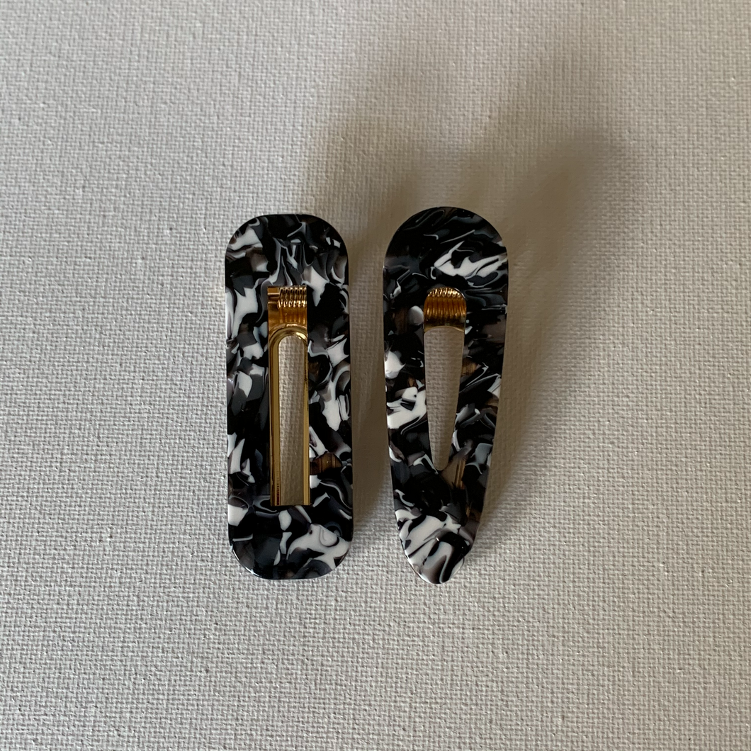 Style your hair with these beautiful duo clips. It is the perfect accessory to any outfit! Both clips are a beautiful black/white colour. Can be worn each as a single clip or together. You can also mix and match with another favourite clip of yours!  Two clips 