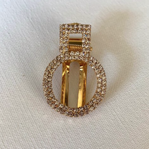 Style your hair with this beautiful circle rhinestone clip in gold. It is the perfect accessory to any outfit! Can be worn as a single clip or you can also mix and match with another favourite clip of yours!  One piece