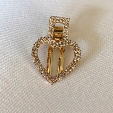 Style your hair with this beautiful heart rhinestone clip in gold. It is the perfect accessory to any outfit! Can be worn as a single clip or you can also mix and match with another favourite clip of yours!  One piece