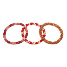 Load image into Gallery viewer, These &quot;Mexican Chile Roll Ons&quot; come as a set of three.  They are handmade with love by women artisans in Nepal, using high quality glass beads and hand-dyed cotton thread. These bracelets will expand over your hand to fit most wrist.   The purchase of these bracelets empowers female artisans through fair trade. Your purchase provides women with fair income + benefits in a safe and healthy work environment. Aid Through Trade empowers women by creating opportunity through beautifully designed jewelry.
