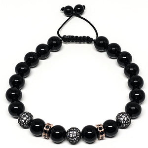 LAST ONE AVAILABLE!!  If you love black agate with rose gold and silver this is the perfect bracelet for your collection. Black agate is a grounding and protective crystal. It gives a calming peace that helps those in periods of stress. This adjustable bracelet ensures the perfect fit.  Fit size M-L   8mm Black Agate Beads  Black Cubic Zirconia   Rose Gold Plated Brass