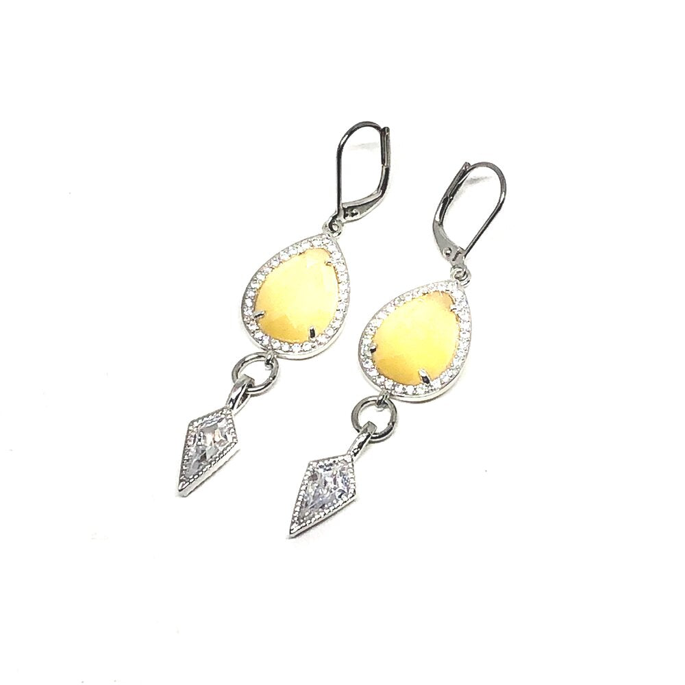 These beautiful earrings are perfect to wear with any outfit or with our matching necklace.   Yellow agate crystals surrounded with czech crystals   Each earring has a drop cubic zirconia   White gold plated frenchback closures   Hypoallergenic 