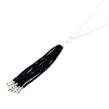 Load image into Gallery viewer, Discover eye-catching, straight-off-the-runway inspired pieces. One statement piece, infinite possibilities…  Merx Modern is exclusively designed and handmade in Canada.  This necklace has black crystal tassels on a silver chain   This necklace length is 30” + 2” extender &amp; clasp  Tassel hangs down 4.5”
