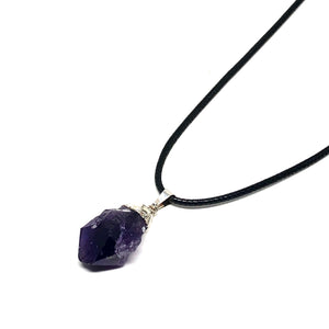 Known for its metaphysical abilities to still the mind and inspire an enhanced meditative state. Its inherent high frequency purifies the aura of any negative energy or attachments, and creates a protective shield of Light around the body, allowing one to remain clear and centered while opening to spiritual direction. This necklace is 18” in length on a black cord chain with a 1” extender.  Color, cut and shape of stone may vary
