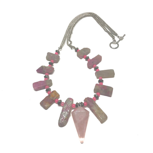 This necklace has genuine rose quartz stones set between the genuine pink tourmaline stones.  All finishings and charms are white gold plated.  This necklace is rhodium plated, lead and nickel free and tarnish resistant.  This necklace is 24” in length with a toggle clasp  Rose Quartz Pendant is 1.5” x 3/4”