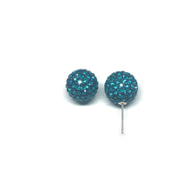 Load image into Gallery viewer, These genuine turquoise swarovski crystal studs are hand set in a clay base.  The post and backs are sterling silver   Hypoallergenic, lead and nickel free 
