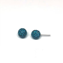 Load image into Gallery viewer, These genuine turquoise swarovski crystal studs are hand set in a clay base.  The post and backs are sterling silver   Hypoallergenic, lead and nickel free 
