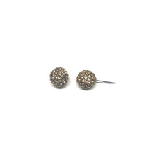 Load image into Gallery viewer, These genuine light topaz swarovski crystal studs are hand set in a clay base.  The post and backs are sterling silver   Hypoallergenic, lead and nickel free 
