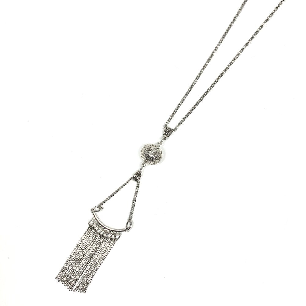 This trendy fringe with ball necklace is rhodium plated so will not tarnish.  Ball is white gold plated  Hypoallergenic  This necklace is 21” with white gold plated toggle clasp