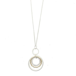 Discover eye-catching, straight-off-the-runway inspired pieces. One statement piece, infinite possibilities…  Merx Modern is exclusively designed and handmade in Canada.  This necklace is a matte silver, matte gold and a circle of crystals.   This necklace length is 30” + 3” extender & clasp  Pendant is 3” x 2”