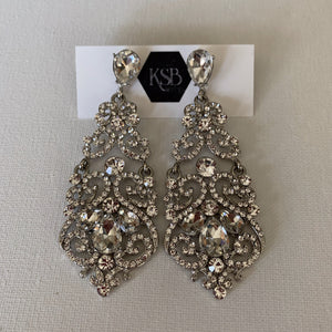 These long hanging crystal bridal earrings are all that you need to complement your beautiful bridal gown.   They are hypoallergenic, lead, nickel and cadmium free.  They contain czech crystals and AAA+ Cubic Zirconia   From top to bottom of earring is 9 cm in length 