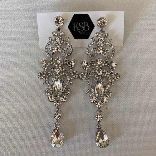 These rhodium plated crystal earrings are perfect to go with your bridal gown or that special evening dress.  They are hypoallergenic, lead, nickel and cadmium free.  They contain czech crystals and AAA+ Cubic Zirconia   From top to bottom of earring is 3 cm in length 