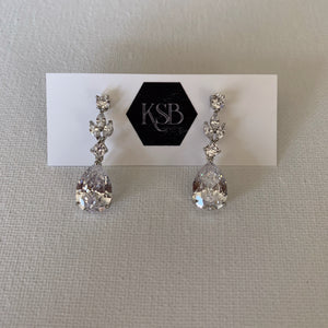 These rhodium plated crystal earrings are perfect to go with your bridal gown or that special evening dress.  They are hypoallergenic, lead, nickel and cadmium free.  They contain czech crystals and AAA+ Cubic Zirconia   From top to bottom of earring is 3 cm in length 