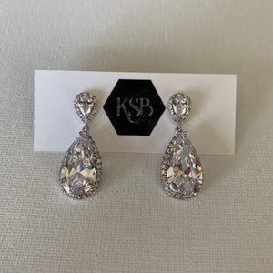 These earrings are absolutely stunning!  They are rhodium plated.   High quality AAA+ cubic zirconia including small cubic zirconia around the entire earring.    These earrings are so beautiful   Lead, nickel and cadmium free  Hypoallergenic 