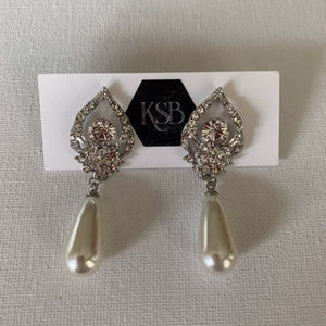 These crystal and pearl earrings are perfect to go with your bridal gown or that special evening dress.  They are hypoallergenic, lead, nickel and cadmium free.  They contain high quality czech rhinestone, crystals and simulated pearls   From top to bottom of earring is 5 cm in length 