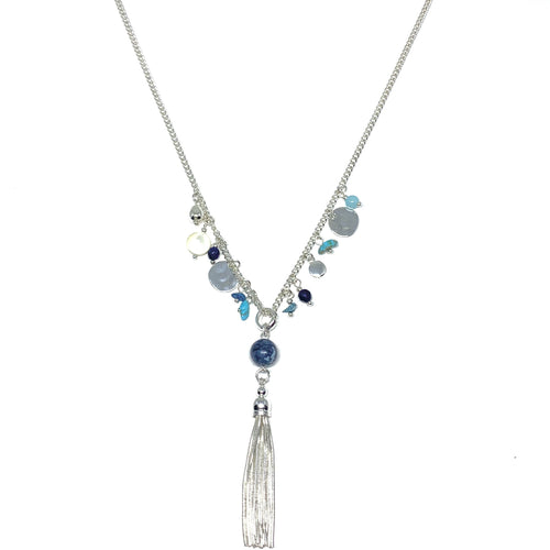 Discover eye-catching, straight-off-the-runway inspired pieces. One statement piece, infinite possibilities…  Merx Modern is exclusively designed and handmade in Canada.  This silver chain necklace has blue & turquoise semi-precious stones and the length is 30” + 2” extender & clasp  The tassel hangs down 4”