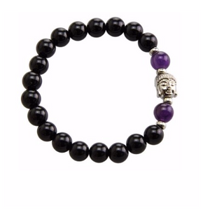 Stretchable bracelet with two amethyst beads surrounding a Buddha charm. Accented with black onyx beads.  Amethyst is the purple variety of quartz crystal composed of silicon dioxide with traces of iron. As a healing stone, black onyx is thought to increase regeneration, happiness, intuition and instincts.  Includes:  1 bracelet, 18 cm in circumference with stretch cord, 9 mm beads