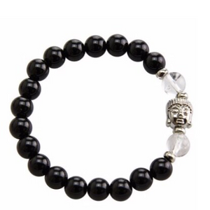 Stretchable bracelet with two clear quartz beads surrounding a Buddha charm. Accented with black onyx beads.As a healing stone, black onyx is thought to increase regeneration, happiness, intuition and instincts.  Includes:  1 bracelet, 18 cm in circumference with stretch cord, 9 mm beads