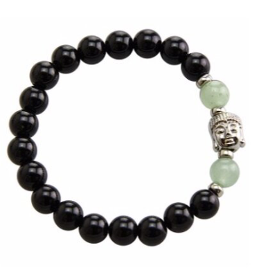 Stretchable bracelet with two green aventurine beads surrounding a Buddha charm. Accented with black onyx beads.As a healing stone, black onyx is thought to increase regeneration, happiness, intuition and instincts.  Includes:  1 bracelet, 18 cm in circumference with stretch cord, 9 mm beads 