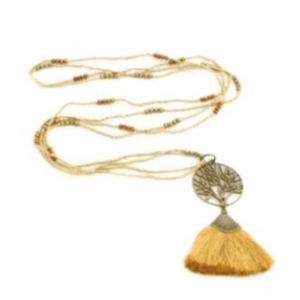 This necklace is handcrafted by artisans from Bali, Indonesia. All materials to make this necklace come from materials locally sourced. Local artisans hand-craft these original designs, bringing them to life.  If your looking for a long trendy, light weight necklace to wear with your summer outfits, this is the one!  This necklace is 45” in length  Tassel Pendant hangs 4”