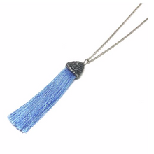 Load image into Gallery viewer, The tassel has almost always been a symbol of power and prestige.  This beautiful handcrafted tassel necklace is on a 27” rhodium plated chain.  This necklace has stunning genuine czech crystals and beautiful silk tassel. It is lead and nickel free and is tarnish resistant.  Designed and handcrafted by Canadian Artisan
