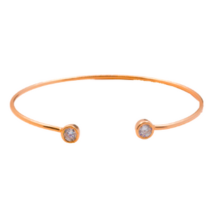 This 925 sterling silver cuff bangle is the perfect complement to any outfit. Can be worn stacked or on its own.  High quality cubic zirconia on each side of bangle.  Sterling silver with 14K Rose Gold plated  Lead, nickel free, tarnish resistant  58mm