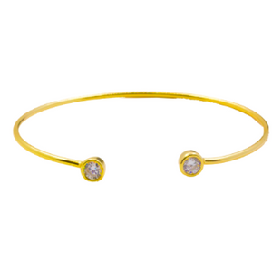 This 925 sterling silver cuff bangle is the perfect complement to any outfit. Can be worn stacked or on its own.  High quality cubic zirconia on each side of bangle.  Sterling silver with 14K gold plated  Lead, nickel free, tarnish resistant  58mm