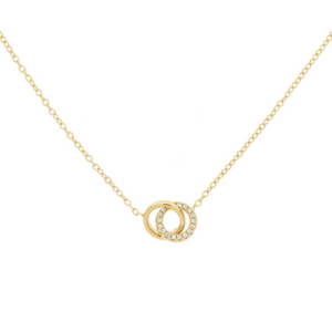 This 925 sterling silver necklace is 14K gold plated and is very dainty with 2 interlocking rings. One ring is surrounded by cubic zirconia.  This necklace is 16” in length with a 2” extender.  Lead and nickel free