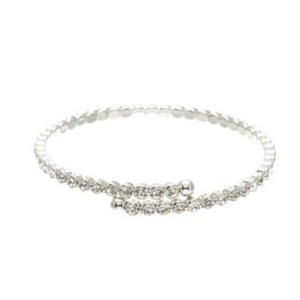 This elegant crystal bangle can be worn on its own or stacked with other bracelets.  Can be worn with your favourite jean outfit or your evening dress.   1 Row of Crystals   Lead & nickel free   Rhodium plated, tarnish resistant 