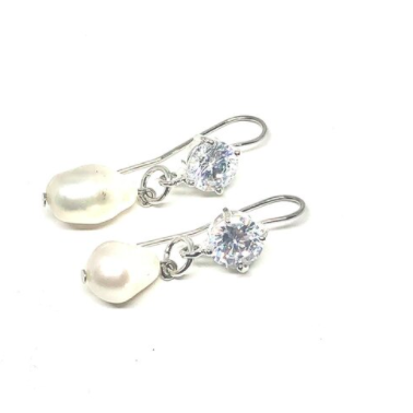 These earrings are genuine freshwater pearl with cubic zirconia   Posts are white gold plated   Hypoallergenic   Lead and nickel free 